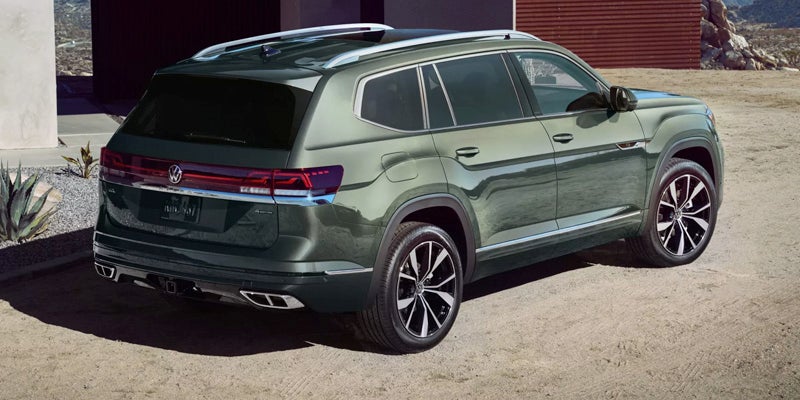 Rear view of a green Volkswagen SUV parked outdoors