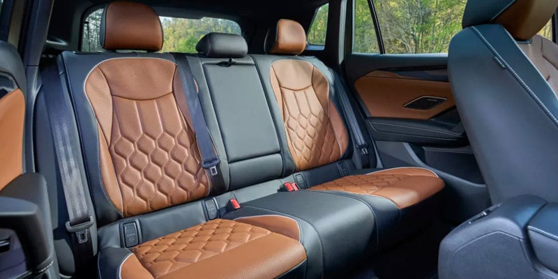 Rear passenger seats with brown leather upholstery
